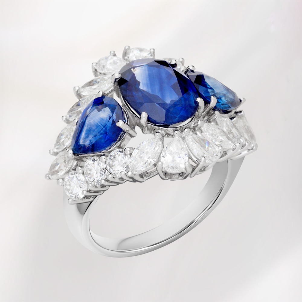 Ring with blue sapphires and diamonds