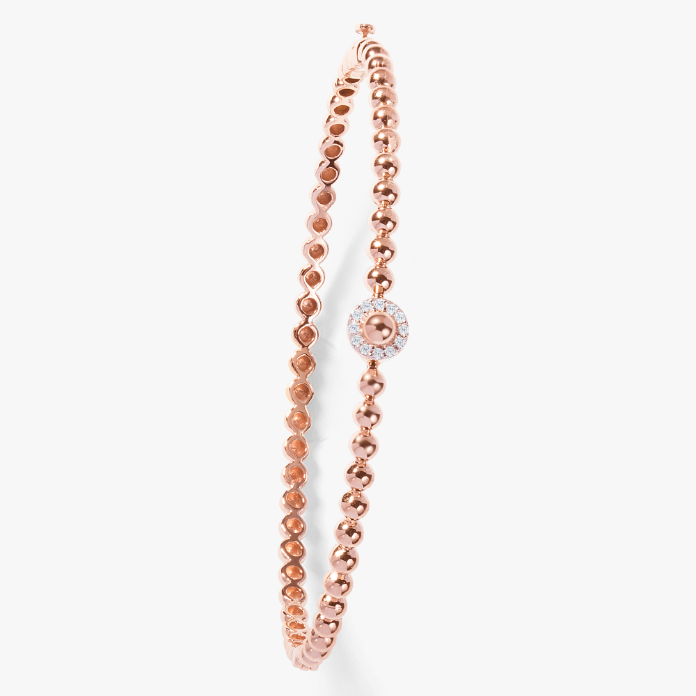 Oubharia essentia bangle in 18k rose gold with diamonds