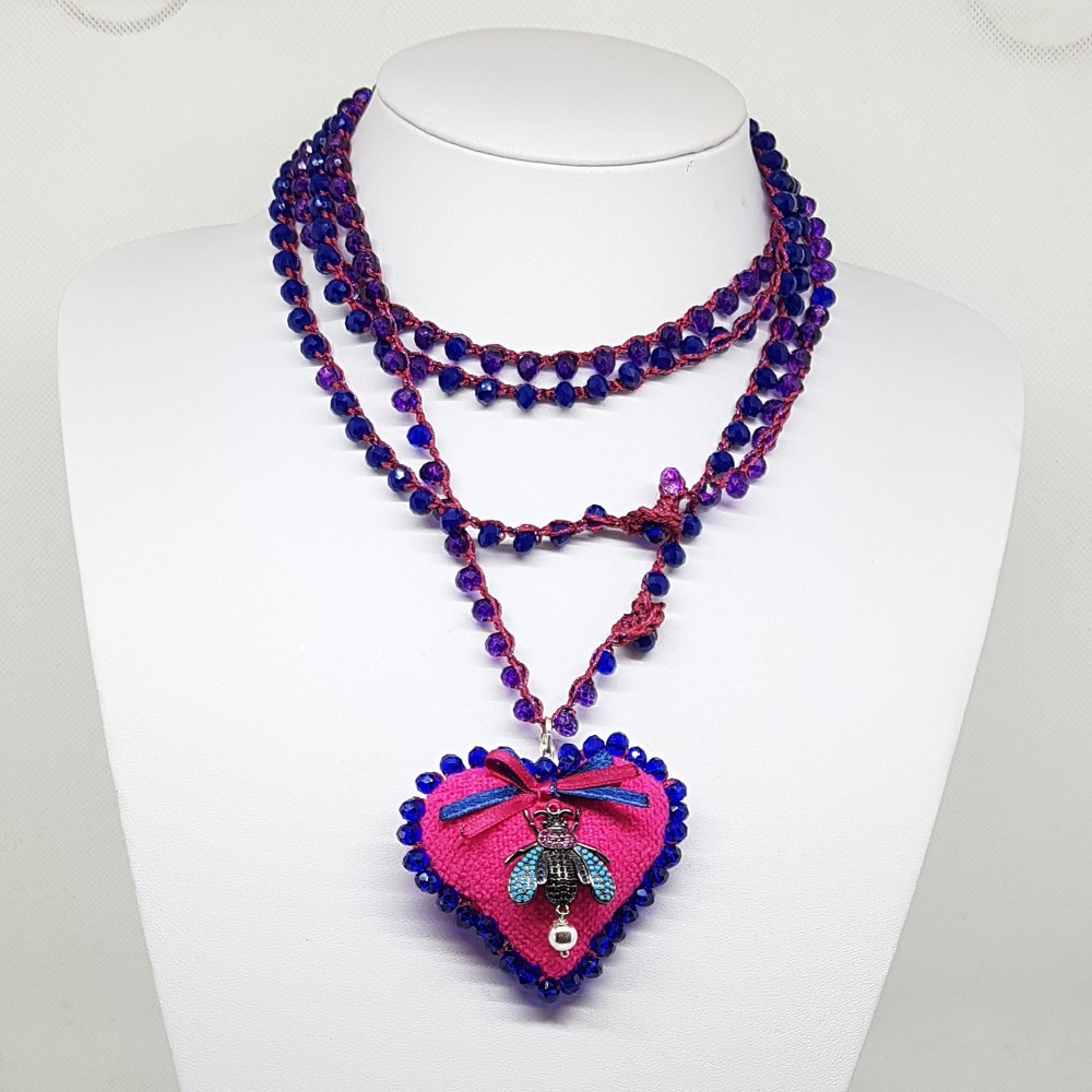 Collana lunga con pendente a cuore